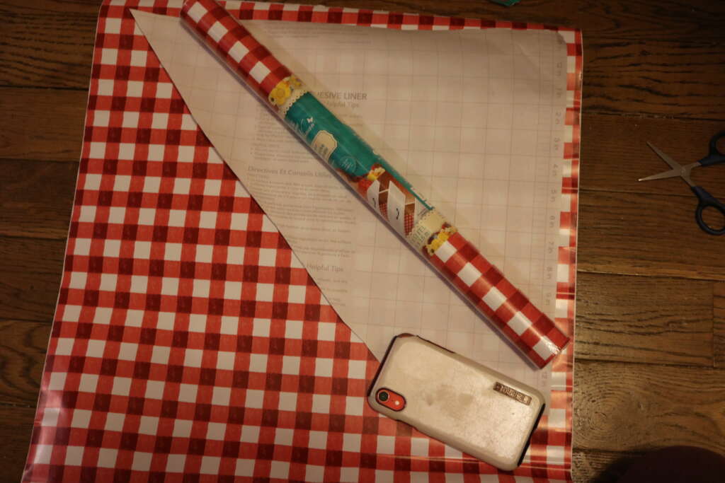 shelf liners project: template for cutting out shelf liner for awkward spot
