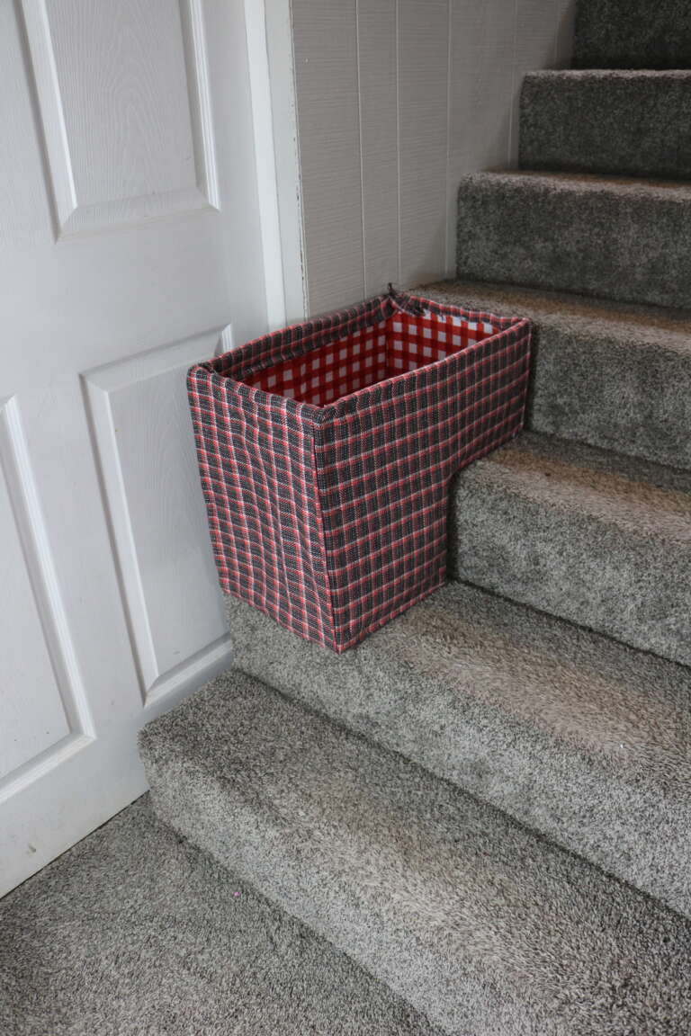 how to make a stair basket out of cardboard and fabric (no sew project)